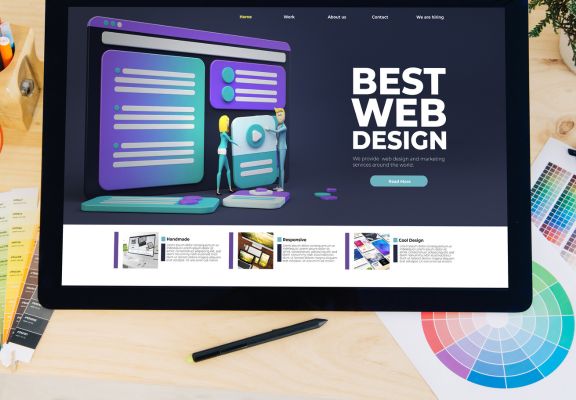 Best web design showcased on a digital tablet, featuring colorful user interface elements, animated characters, and a layout emphasizing marketing and digital solutions.